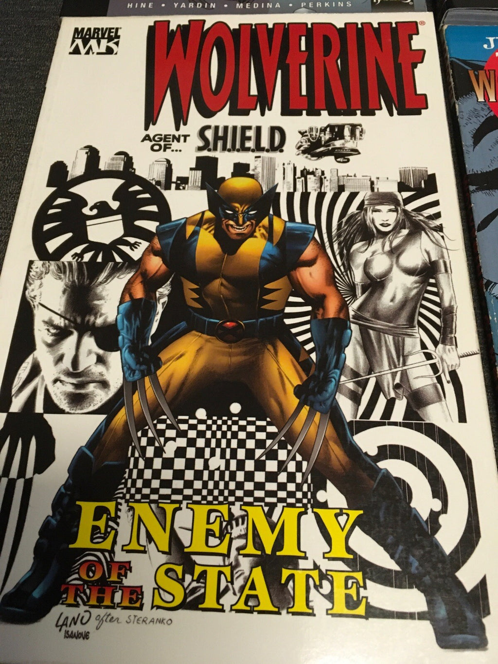 Lot of 4 Marvel Comic Books x-men;; District X;; Wolverine;; Marvel Knights2