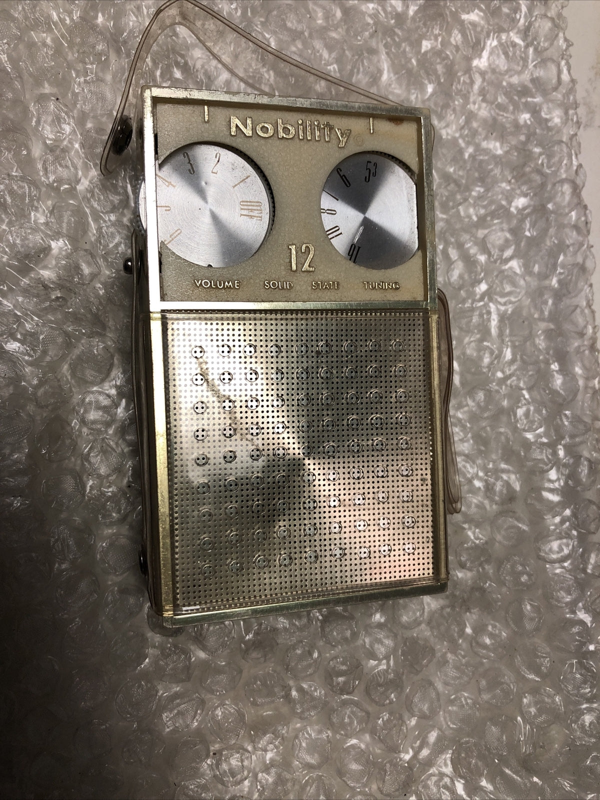 NOBILITY 12 - TRANSISTOR RADIO WITH CLEAR CASE0