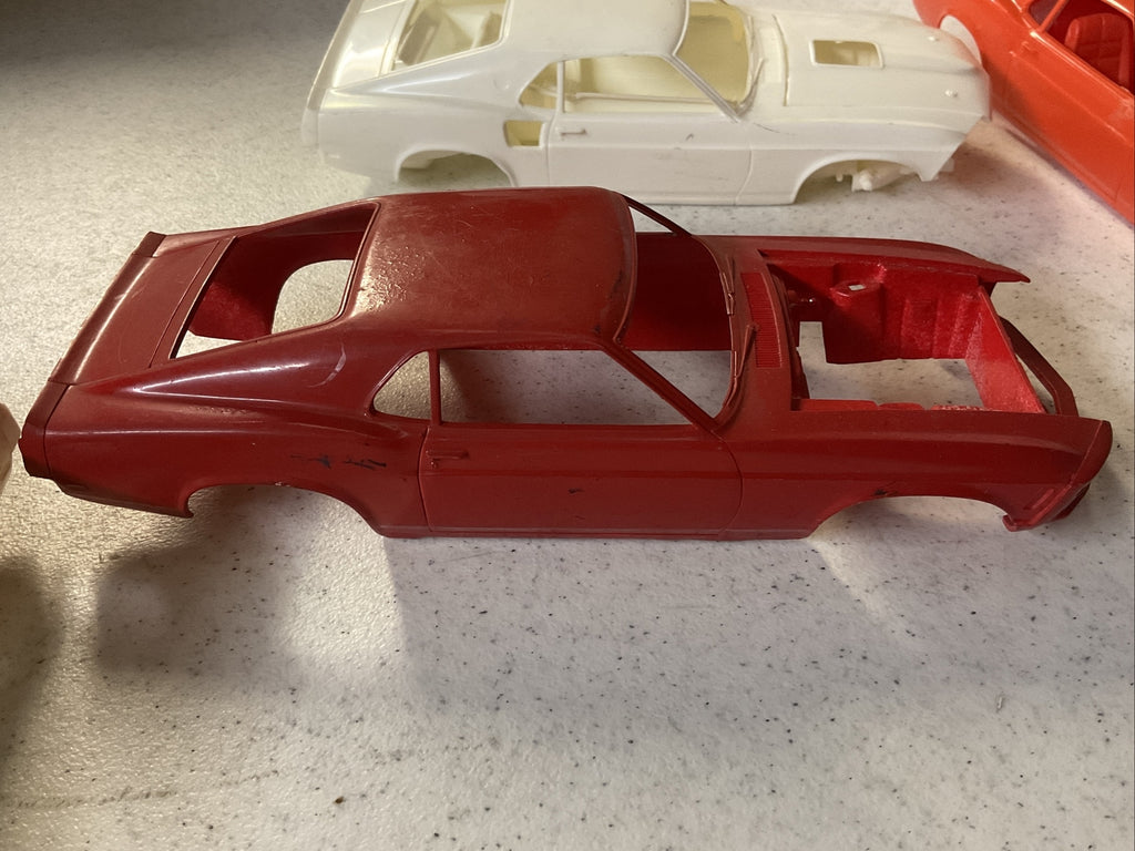 Vintage model car junkyard Body Lot. Ford, Mustang’s3