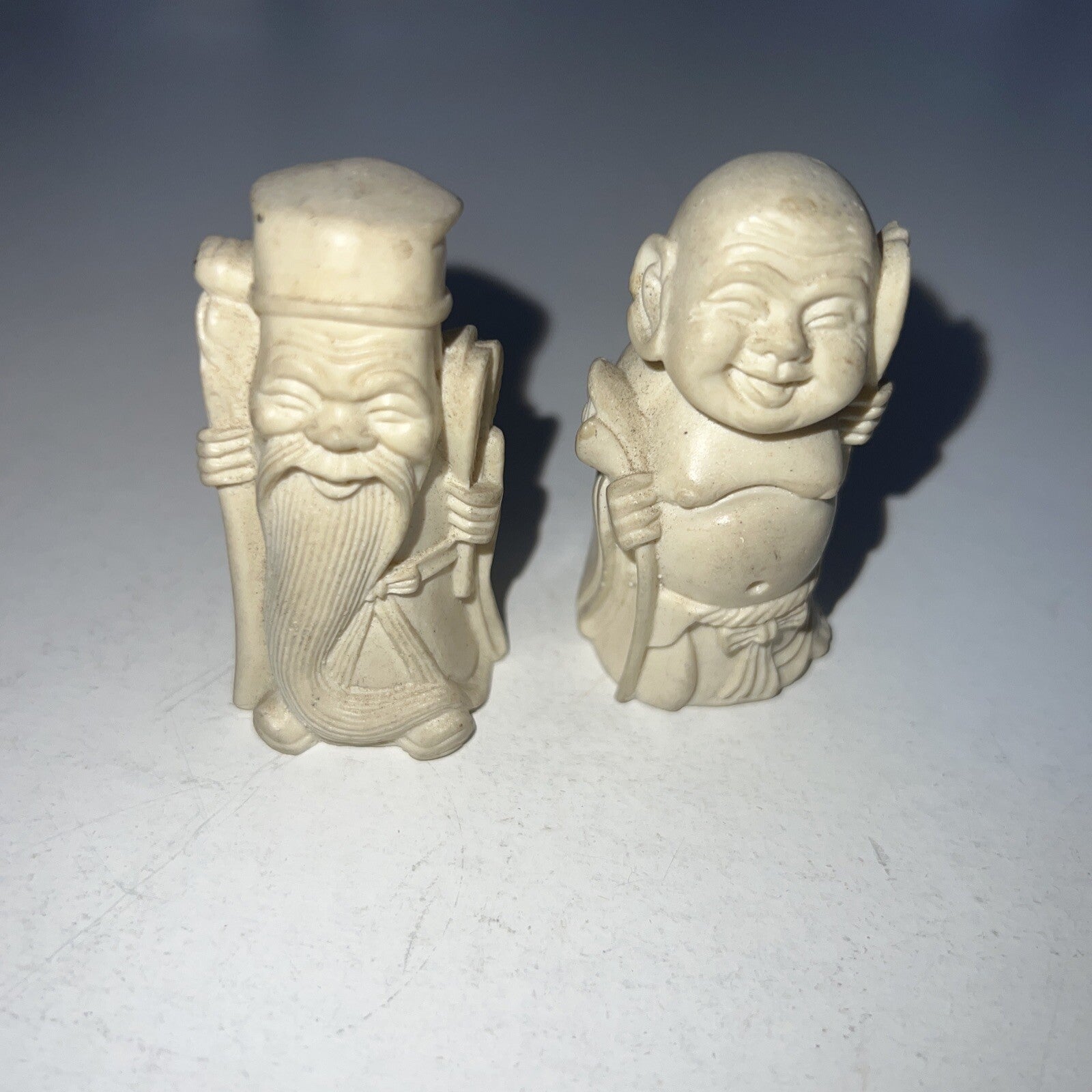 Small Vintage White Carved Confucius and Buddha Figurines 0